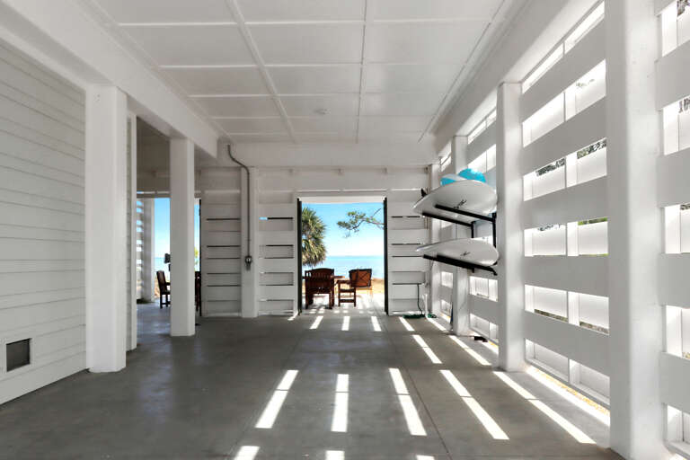 Under House With a View of Bay and Patio
