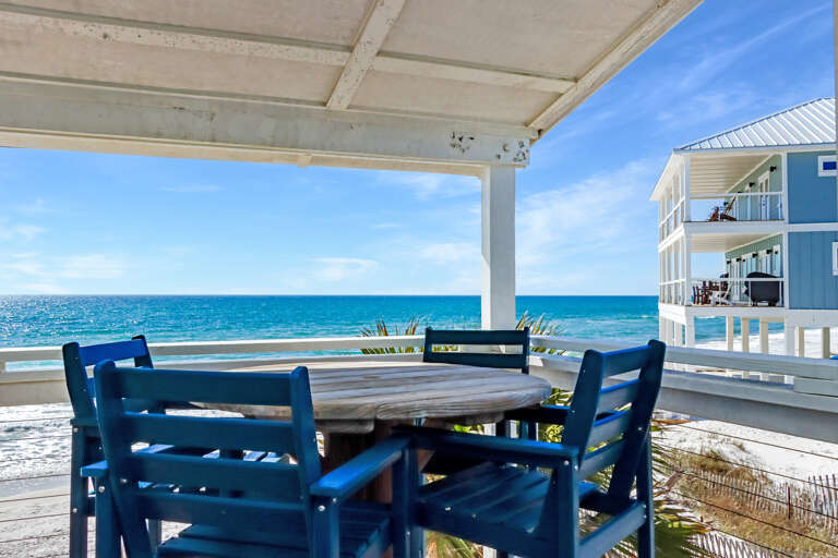 Dine al fresco on the beachfront deck