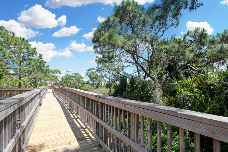 Beachfront Boardwalk Connects Both Streets of the Community