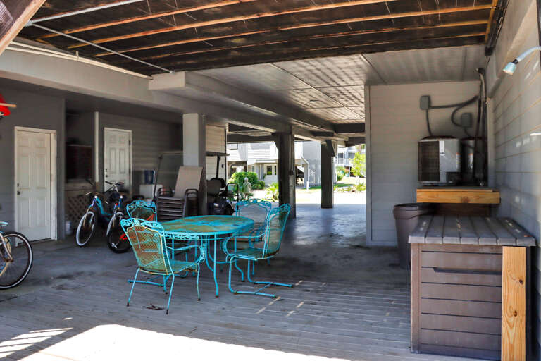 Outdoor Shower and Dining Under House