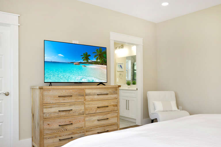 Bedroom 1 with TV and Master Bathroom