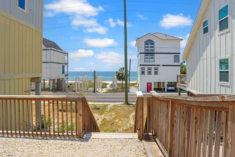 Beach View from Backyard with Steps Leading to Beach