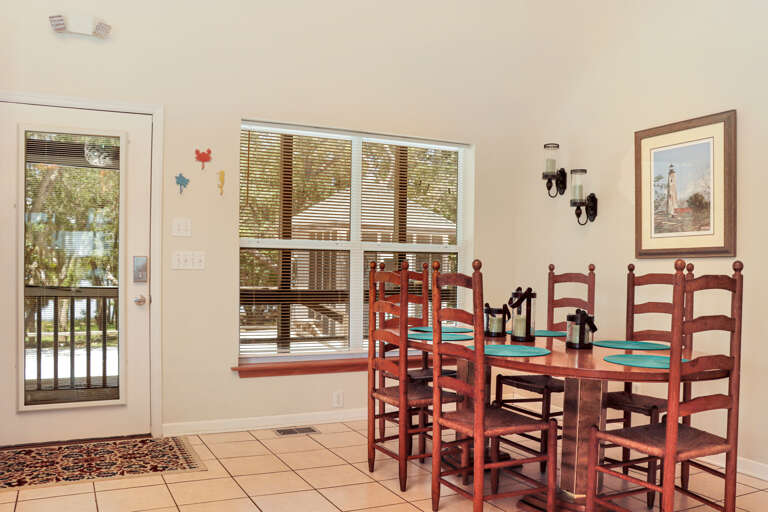 Dining Area with View onto Screened Porch