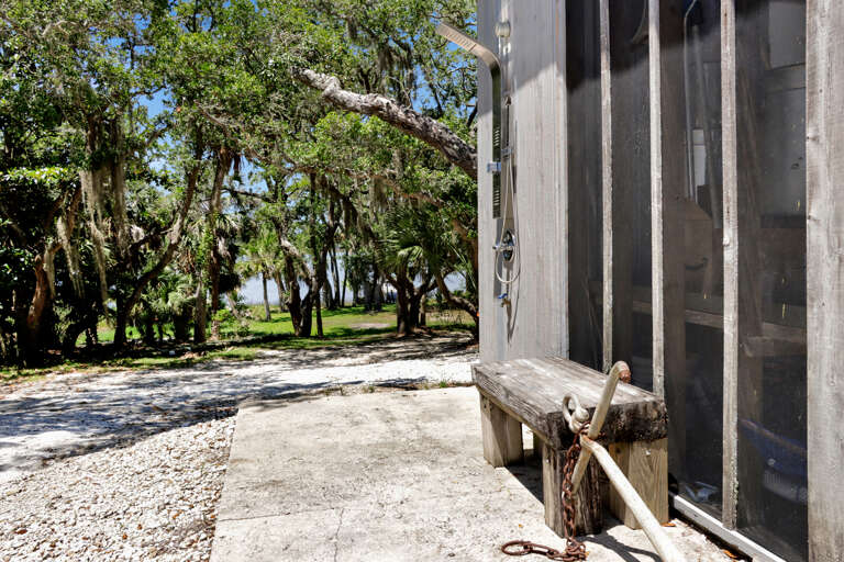 Outdoor Shower on Side of Outhouse
