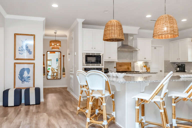 Kitchen and Hallway to Half Bath