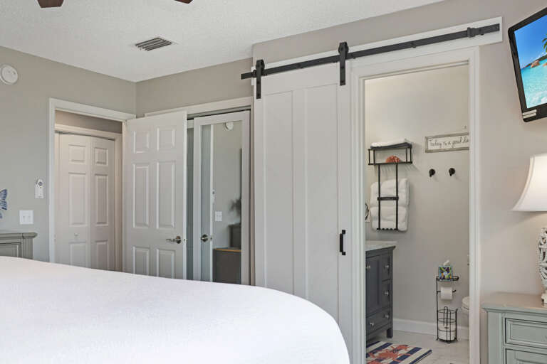 Bedroom 3 with TV and Master Bathroom