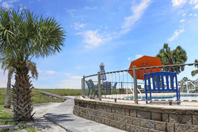 Walkway to Beach Around Pool