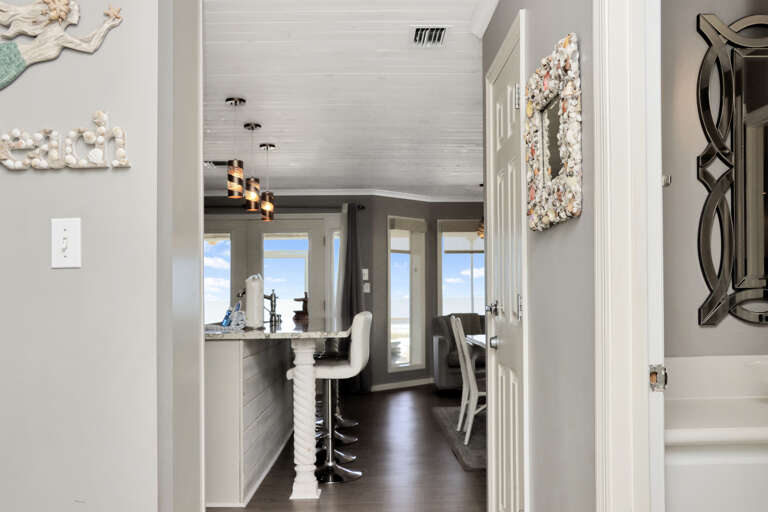 Hallway to Living Area and Bathroom