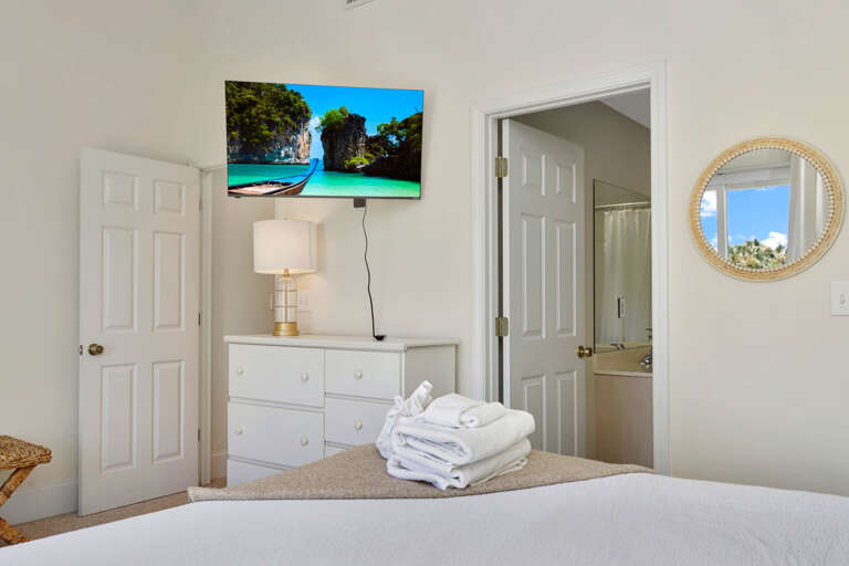 Bedroom 1 with TV and Master Bathroom