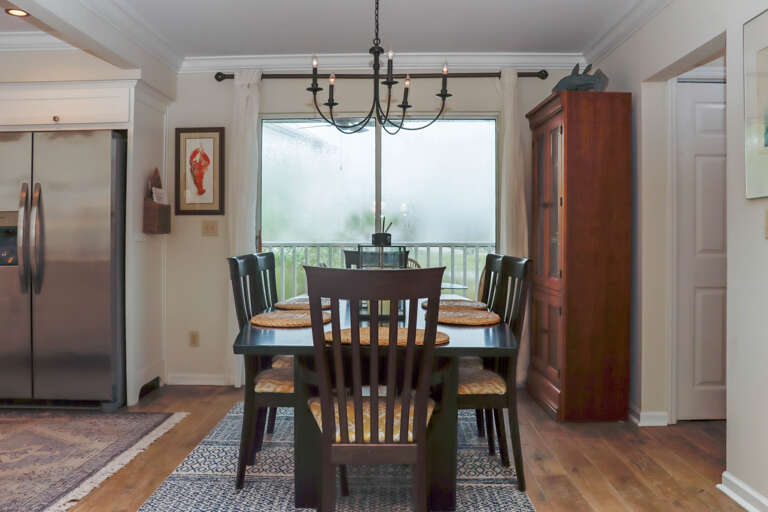 Dining Area with View onto Screened Deck (1)