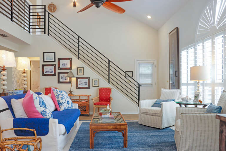 Living Room with Stairway to Second Floor