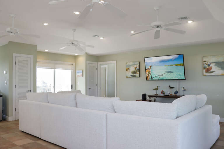 Living Room with TV and Beach View Deck