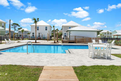 Community Pool with Pool Furniture and Outdoor Restrooms