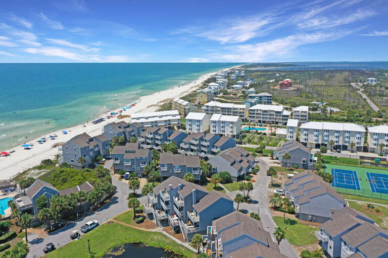 Located Between Tennis Courts and Community Pool