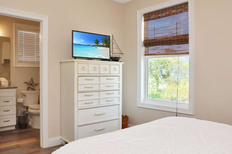 Bedroom 2 with TV and Full Bath