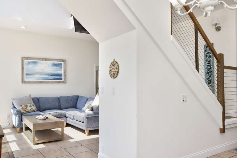 Living Room and Stairs to Top Floor