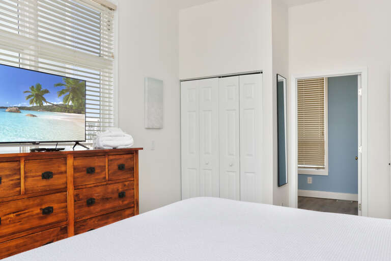 Bedroom 1 with TV and Master Bathroom