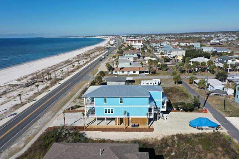 Side Exterior with View Down Mexico Beach
