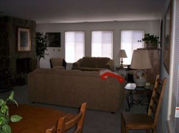 Cozy Living Room With Sofa And Fireplace Cozy Living Room With Sofa And Fireplace