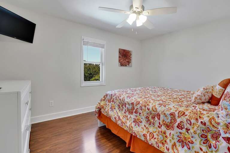 MAIN FLOOR -QUEEN BEDROOM WITH TV