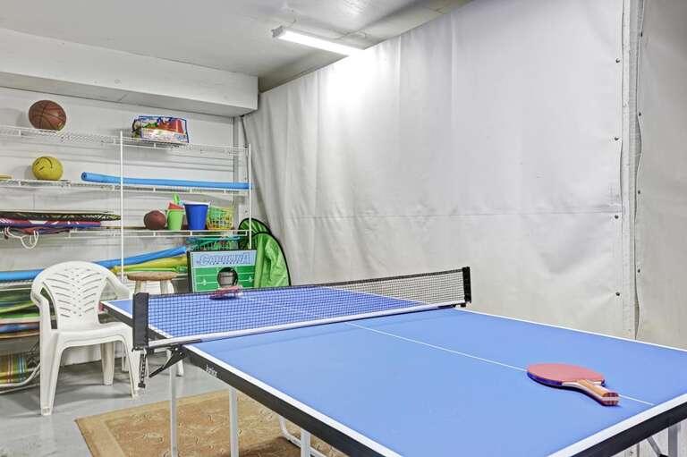 PING PONG TABLE LOCATED IN THE GARAGE