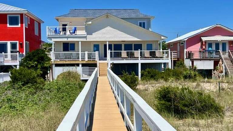 VIEW OF HOUSE FROM BEACH WALKWAY