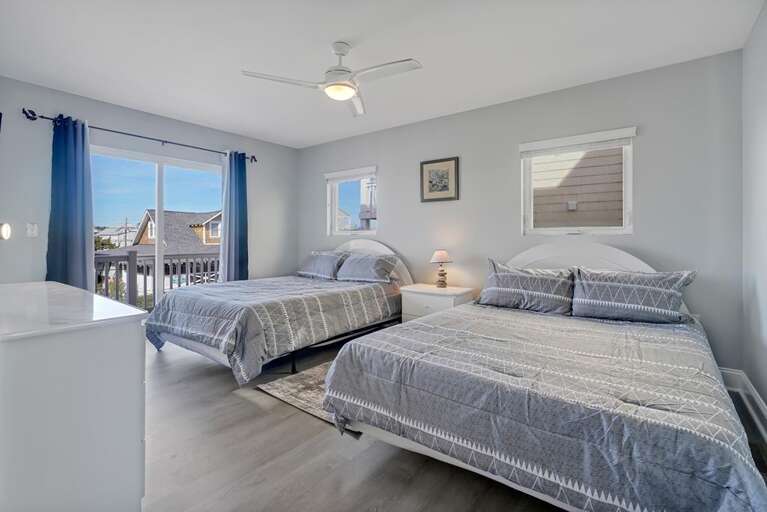 1ST FLOOR- 2 QUEENS W/BALCONY ACCESS SOUTH VIEW 1