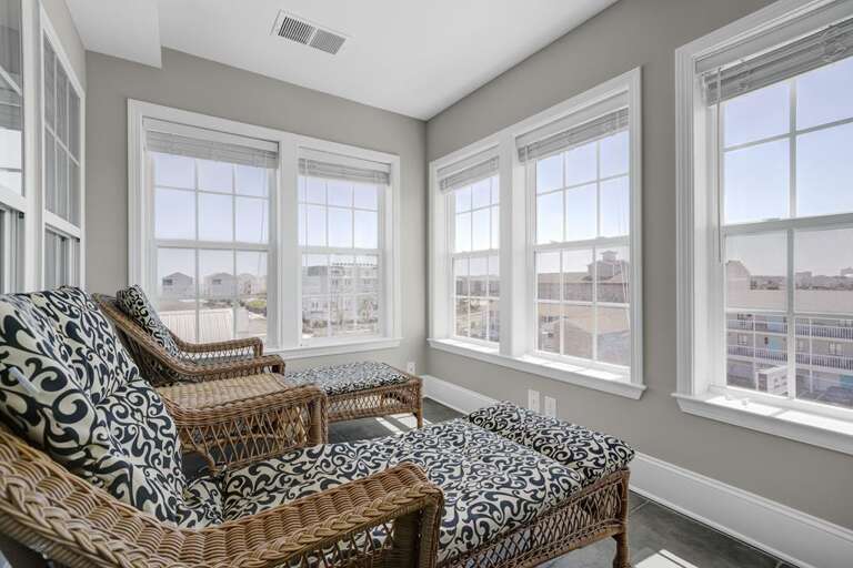 PENTHOUSE -LOUNGING IN THE SUN ROOM