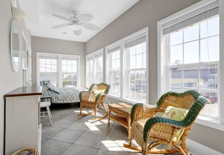 SUN ROOM -SEATING AREA SUN ROOM -SEATING AREA