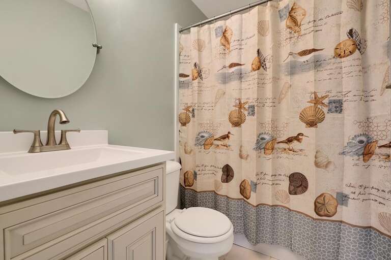 BATHROOM WITH TUB AND SHOWER COMBO