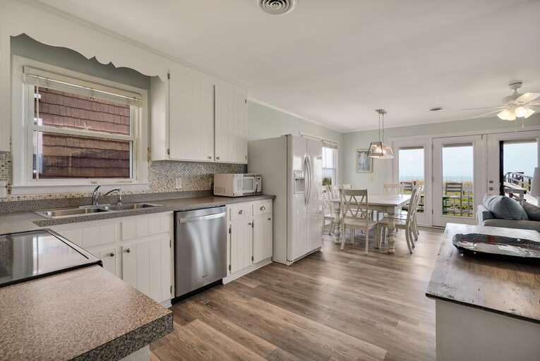 KITCHEN OPEN TO DINING SPACE