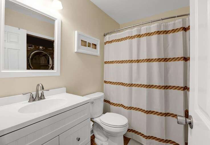 MAIN BATHROOM WITH TUB AND SHOWER COMBO