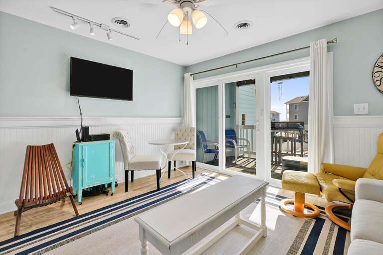 DINING TABLE AND FLAT SCREEN TV