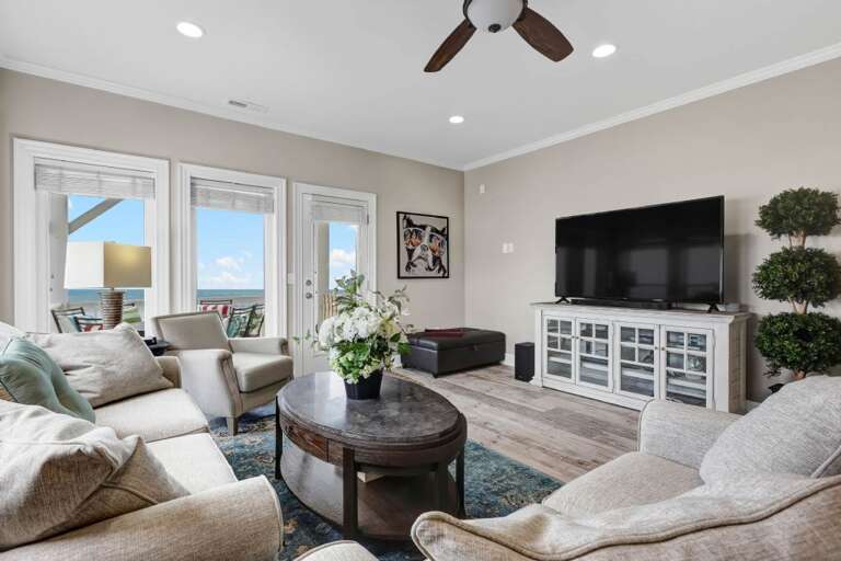 2ND FLOOR LIVING AREA W/ LARGE FLAT SCREEN TV