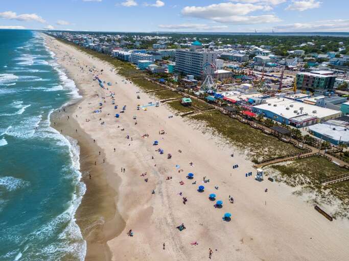 AERIAL CLOSE TO CAROLINA BEACH BOARDWALK AERIAL CLOSE TO CAROLINA BEACH BOARDWALK