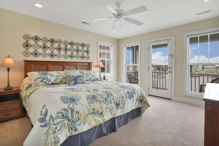 WATERFRONT MASTER BEDROOM WITH  DECK  WATERFRONT MASTER BEDROOM WITH  DECK
