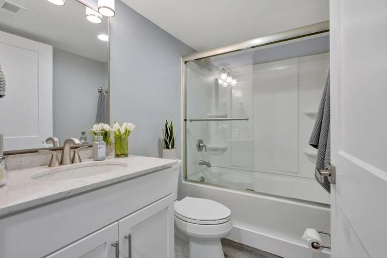 MAIN BATHROOM WITH SHOWER/TUB COMBO