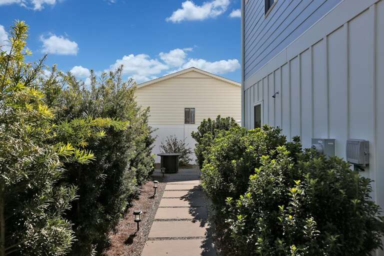 WALKWAY TO THE OUTSIDE SHOWER, FIREPIT & GRILL WALKWAY TO THE OUTSIDE SHOWER, FIREPIT & GRILL
