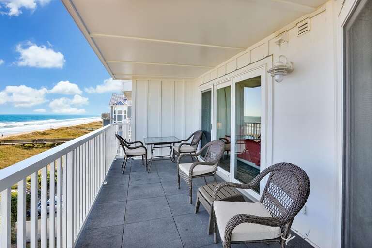 COVERED DECK WITH PLENTY OF SEATING COVERED DECK WITH PLENTY OF SEATING