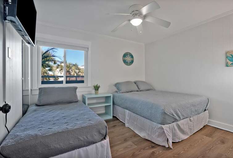 BEDROOM 2 WITH QUEEN AND TWIN VIEW 1