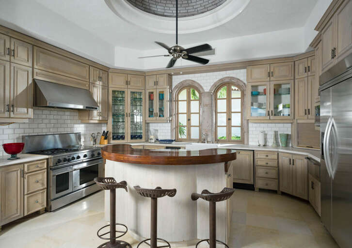 Whip up a culinary masterpiece in Villa Buena Vida's spectacular gourmet kitchen with professional stainless steel appliances!