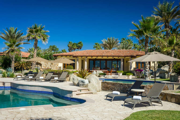 Be amazed by the sky-high lush and green palm trees that surround Villa Las Arenas 104