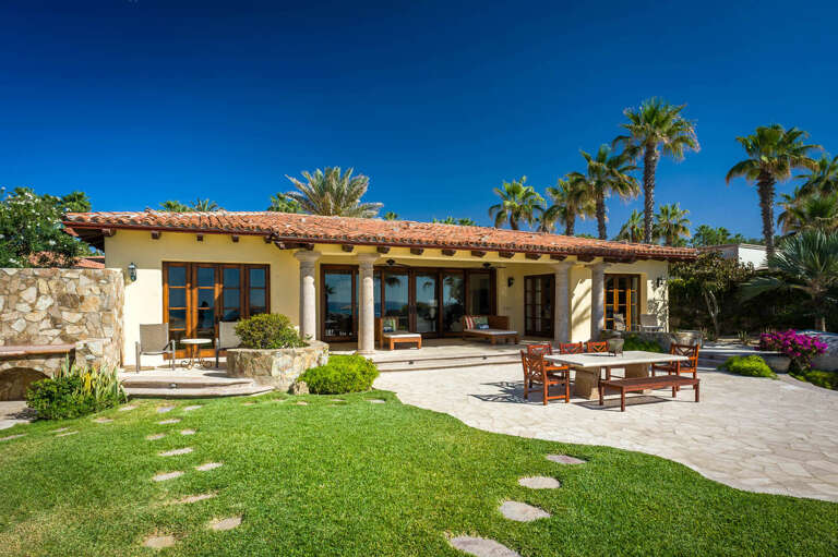 Spend a day at the outdoor dining area surrounded by the stunning landscaping of Villa Las Arenas 104