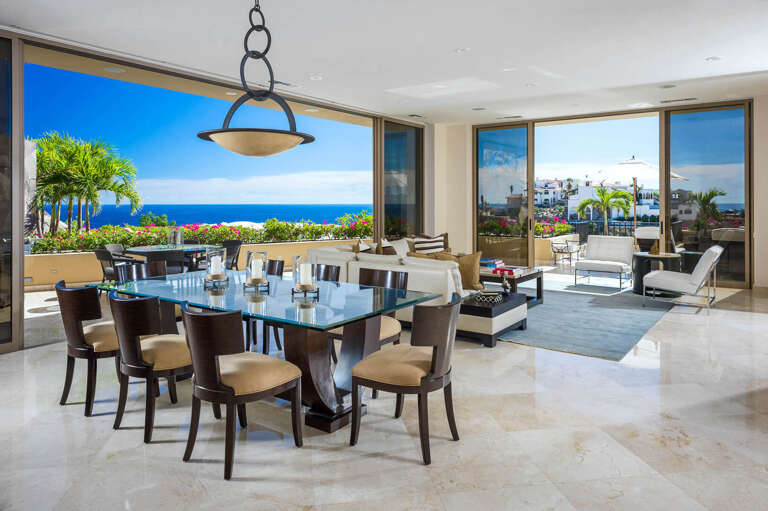 Comfortably sit up to 8 guests at the modern glass dining table