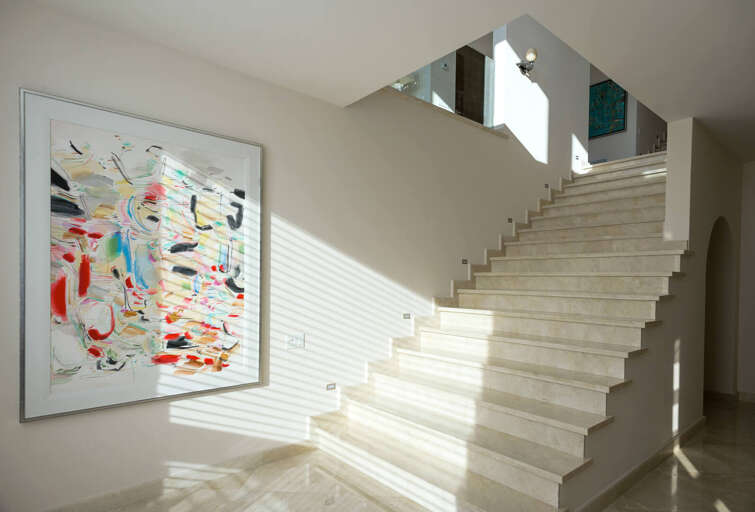 Enjoy the wonderful works of art that are featured throughout the walls of this luxury villa