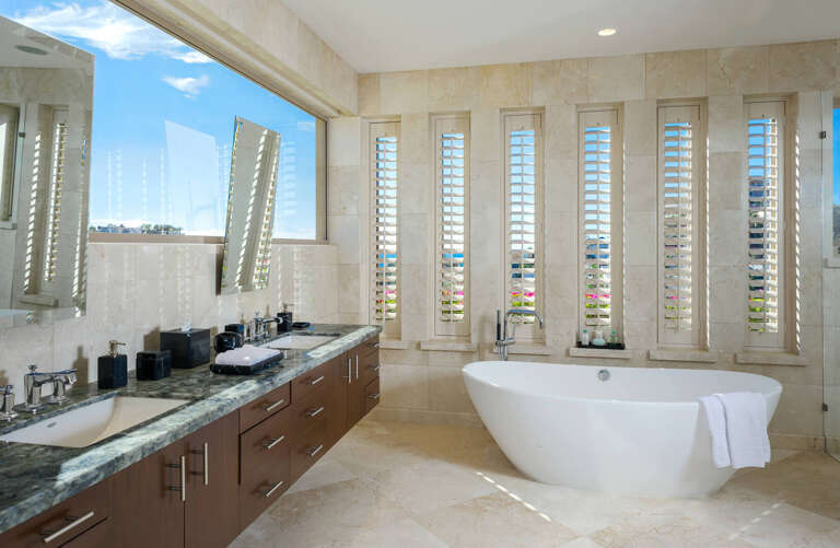 Release the stress and tension from your body with a warm bath in the free-standing soaker tub