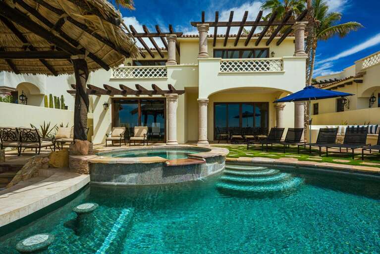 Luxurious Residence With Pool, Palm Shelter, And Patio Loungers