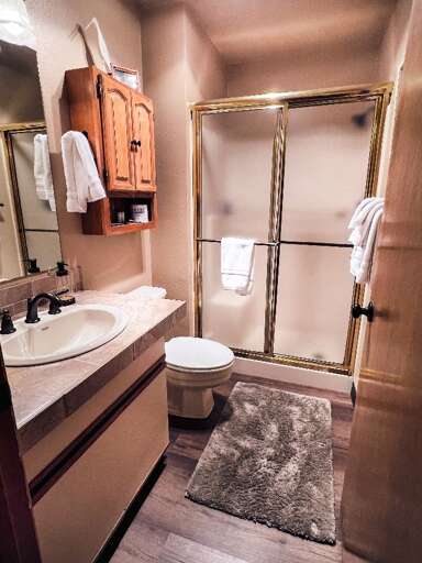 Hall bath with a walk in shower