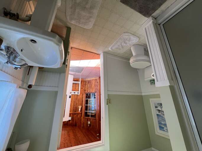 Downstairs bath off Front Entryway