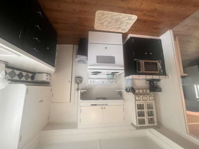 Your fully equipped kitchen awaits with modern appliances and ample storage for preparing delicious meals during your stay.